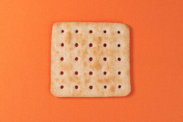Salt crackers on the orange background