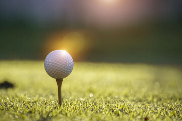 Golf ball on tee ready to play.