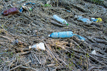 plastic bottles are lying on the ground. ecology 