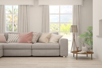 White living room with sofa and summer landscape in window. Scandinavian interior design. 3D illustration