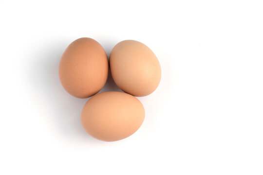Three egg on the left of frame white background