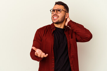Young caucasian man isolated on white background screaming with rage.
