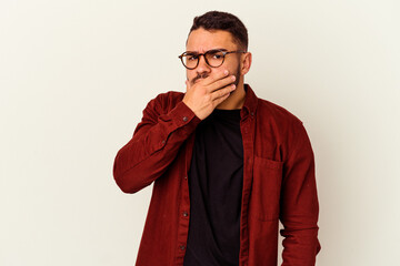 Young caucasian man isolated on white background scared and afraid.