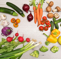 Different fresh vegetables  on wooden table