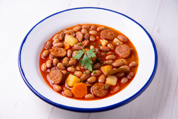 Beans with chorizo. Traditional tapa from the north of Spain in the Asturias region.