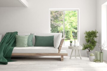 White living room with sofa and summer landscape in window. Scandinavian interior design. 3D illustration