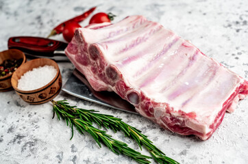 raw pork ribs on a stone background