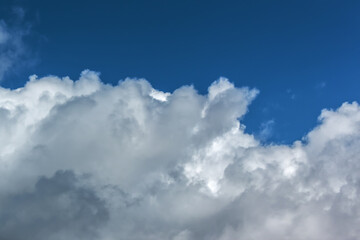 Clouds in the blue sky on a bright cloudy day