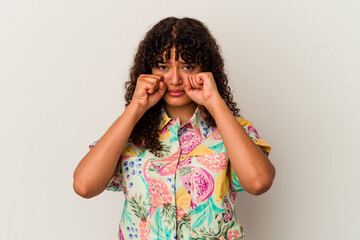 Young mixed race woman isolated on white background whining and crying disconsolately.