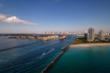 Fototapeta na wymiar Aerial photo shop heading out to sea from Port of Miami