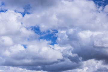 Fototapeta premium Clouds in the blue sky on a bright cloudy day
