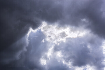 Obraz premium Dramatic thunderstorm clouds background at dark sky