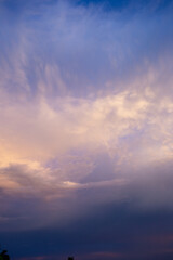 Naklejka na ściany i meble Colorful dramatic sky with cloud at sunset