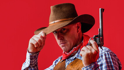 American bandit in mask, western man with hat. Man wearing cowboy hat, gun. West, guns. Portrait of...