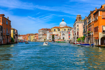 Fototapeta na wymiar Grand Canal with gondola in Venice, Italy. Architecture and landmarks of Venice. Venice postcard