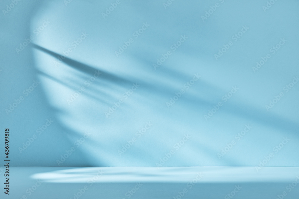 Wall mural Abstract blue background with drop shadow and light. Backdrop for product presentation