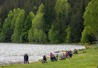 Obraz premium landscape with tourists on the shore of Lake Sfanta Ana - Romania