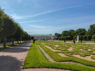 Landscape view of the regular French park with statues and The Palace in Kuskovo Manor.