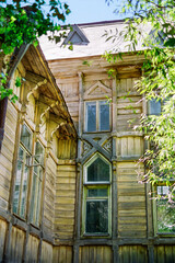 Old window of a wooden house of the late 19th century in Astrakhan (former pastor's house)