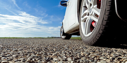 car on the road wheels asphalt grip reliability travel