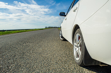 Fototapeta na wymiar car on the road wheels asphalt grip reliability travel