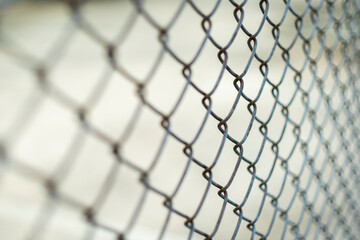 Close-up chain link fence , Sunset background