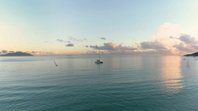 seagulls, drone, clouds, ocean, seychelles, yacht, sky, nature, sunset, sun, water, landscape, travel, summer, sea, beautiful, blue, evening, background, beach, orange, horizon, outdoor, view, sunrise