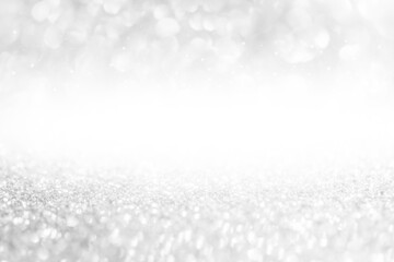 glitter vintage lights background. White, gray and silver. de-focused.used for display products and design.