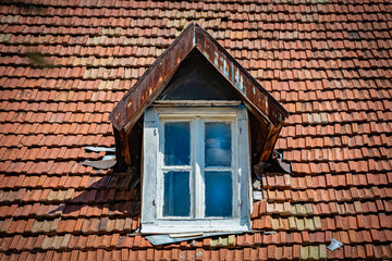 Old tiled roof and window