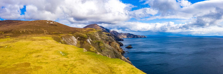 Aerial view of the beautiful coast at Malin Beg with Slieve League in the background in County Donegal, Ireland