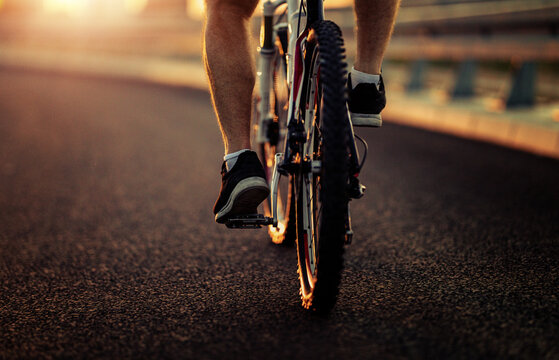 Mountain Biker Riding On Bike In The City