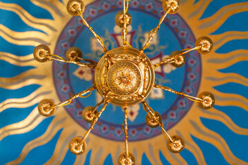 The sun-shaped ceiling of the dome of the church