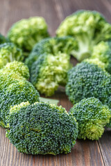  A lot of broccoli for diet and healthy eating. Fresh green broccoli on a   table.Broccoli vegetable is full of vitamin.Vegetables for diet and healthy eating.Organic food.