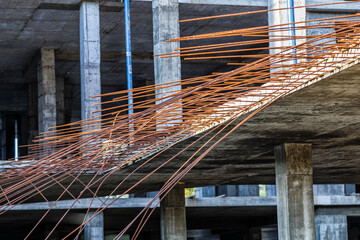 Industrial background. Rebar texture. Rusty rebar for concrete pouring. Steel reinforcement bars. Construction rebar steel work reinforcement. Closeup of Steel rebars.