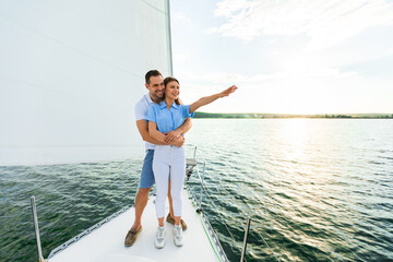 Loving Spouses Sailing Embracing Standing On Yacht Deck