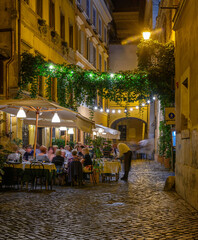 Night cozy old street in Trastevere in Rome, Italy. Trastevere is rione of Rome, on west bank of...