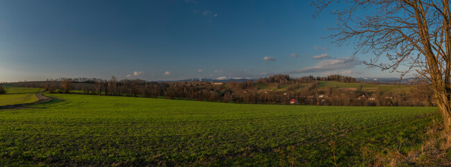 View for Roprachtice village with old church in spring nice sunny evening