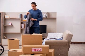 Fototapeta premium Young man moving to new flat