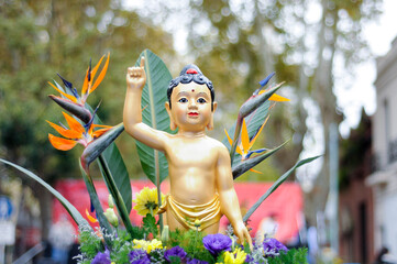 Buddhist monk statue pointing upwards