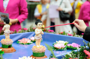 Buddha baptism ceremony in the center of town