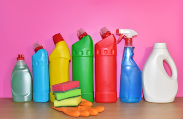 Detergent bottles, sponge for washing and detergent spray cleaner. Household for cleaning and washing. Concentrated and anti-bacterial liquids for dishwasher. Detergents and laundry concept