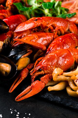 fried large tray appetizer crayfish, squid on black slate