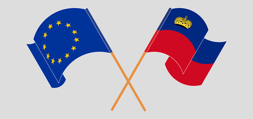 Crossed and waving flags of the EU and Liechtenstein