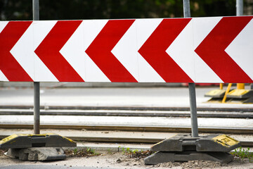 A road barrier informing about road works.
