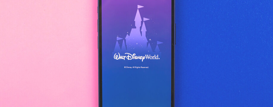 Kharkov, Ukraine - May 28, 2021: Banner with Disney World mobile phone app