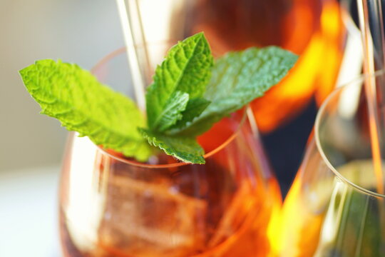 close up of colorful aperitive summer drinks with glass straws