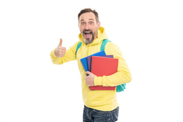mature happy man carry backpack and notebook. smiling senior guy back to school isolated on white