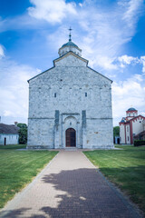 Serbian Orthodox Monastery with cloudy sky. Big Orthodox Monastery in Serbia.