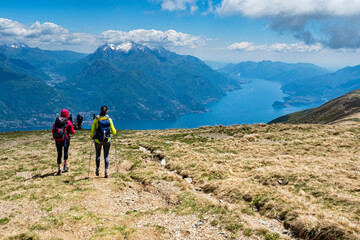 Trekking scene on Lake Como alps