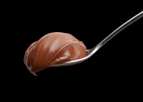 spoon of melted chocolate cream